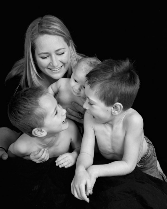 Mother with 3 kids black & white photograph