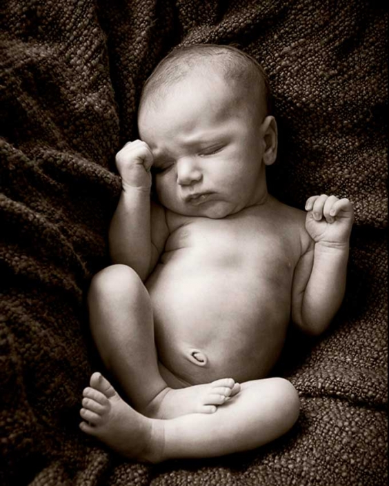 sleeping new born baby photograph in sepia
